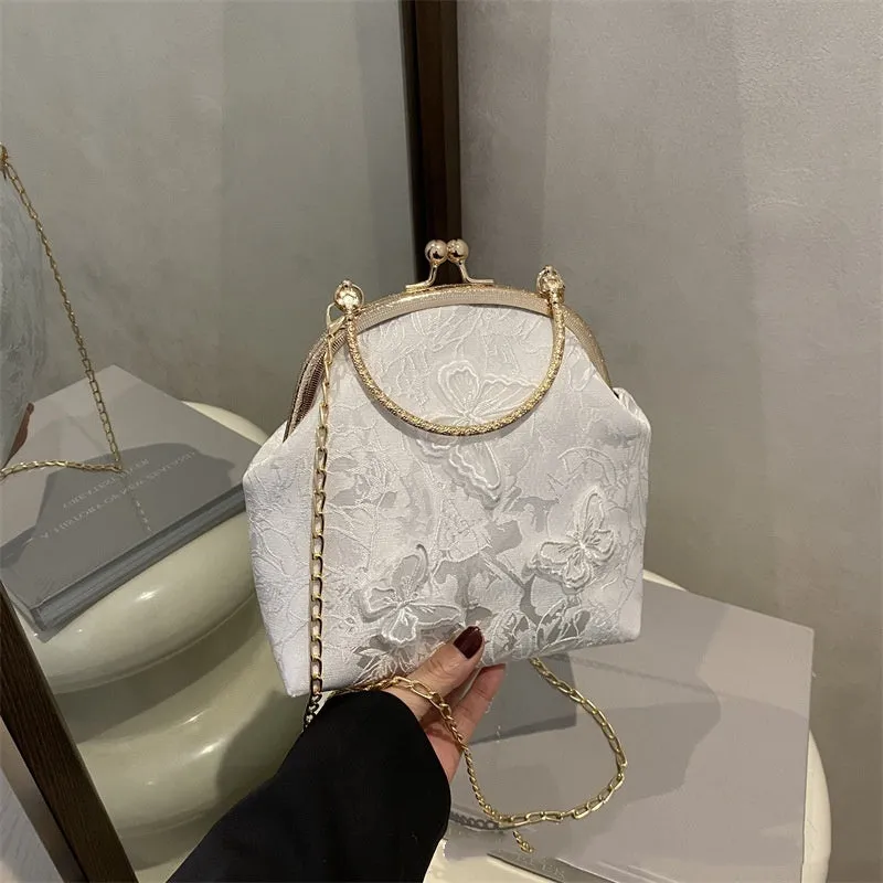 Women's fabric embroidered chain retro messenger bag in bucket shape, soft material, single shoulder strap, colour black