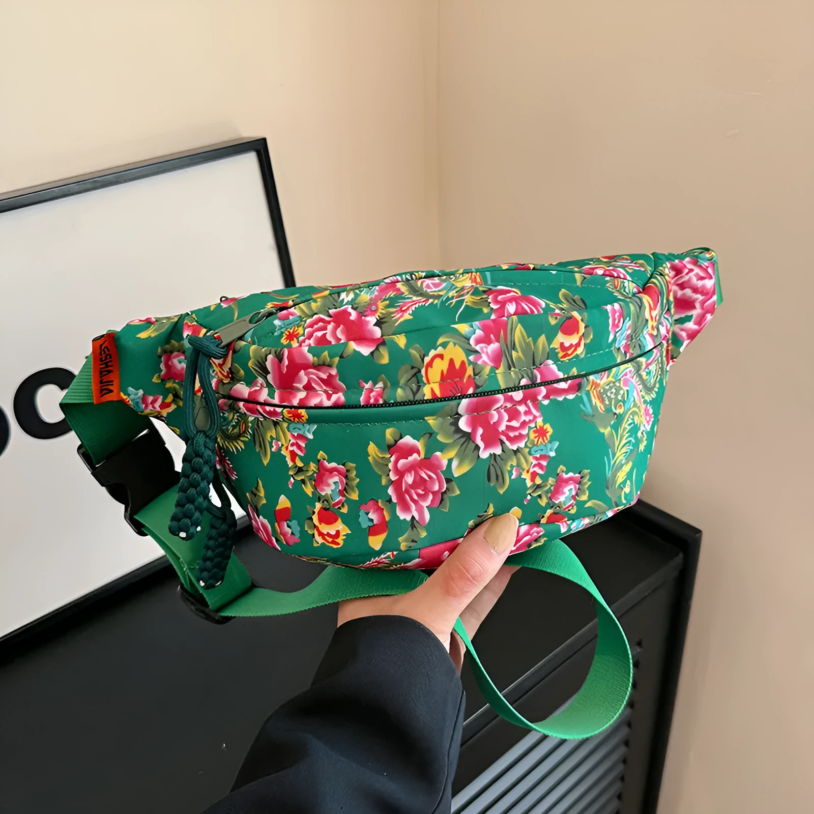 Women's western style waist bag with big flower design and contrast stitching in nylon material