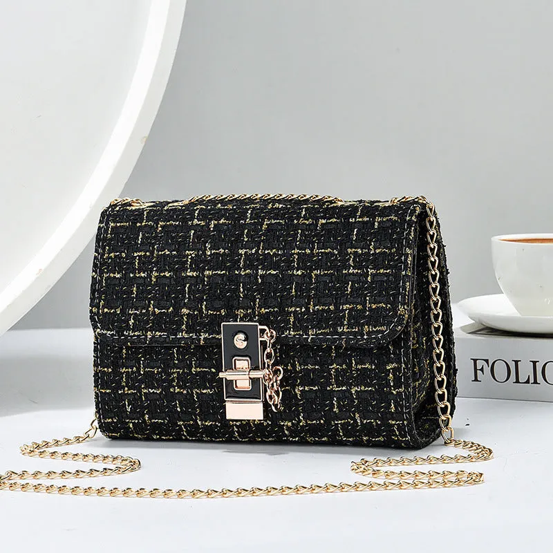 Woolen twist lock shoulder bag with gold silk contrast colour, clamshell design, and chain accent in beige