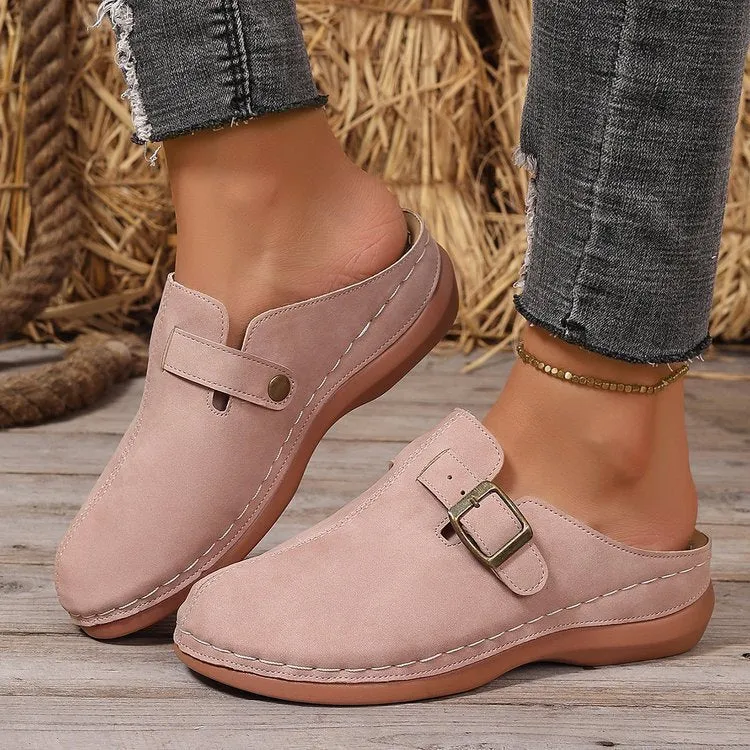Women's lightweight wedge slipper in cloth with rubber sole, shown in one of five colours.