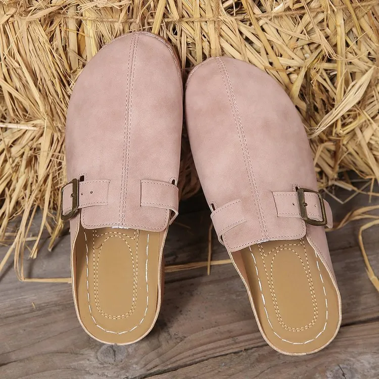 Women's lightweight wedge slipper in cloth with rubber sole, shown in one of five colours.