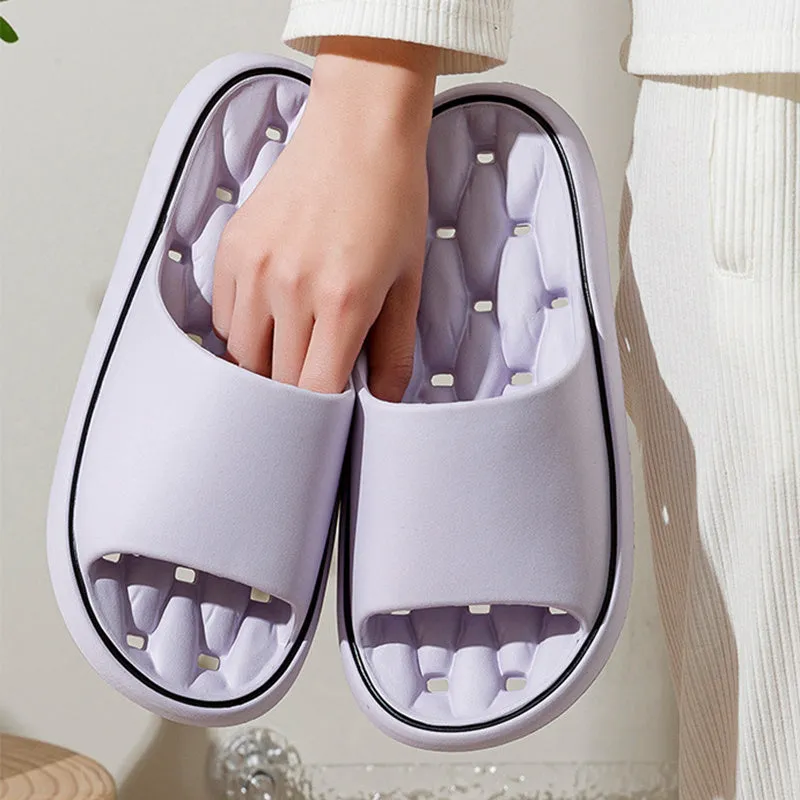 Non-slip EVA bathroom slippers with thick sole and hollow upper in grey, side view