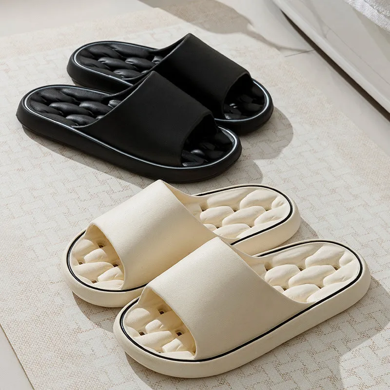 Non-slip EVA bathroom slippers with thick sole and hollow upper in grey, side view