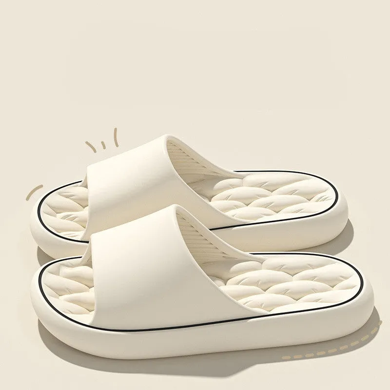 Non-slip EVA bathroom slippers with thick sole and hollow upper in grey, side view