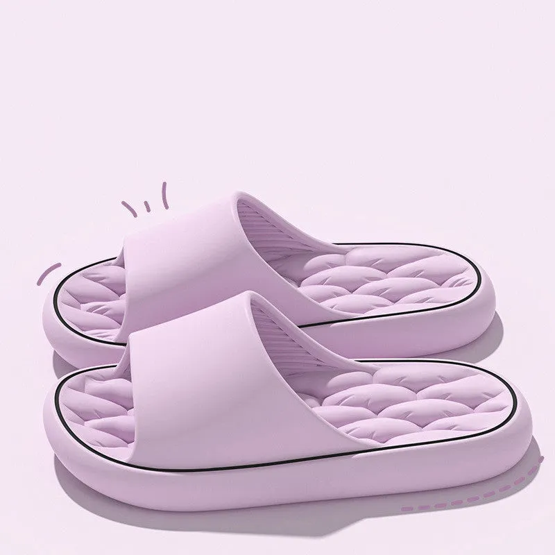 Non-slip EVA bathroom slippers with thick sole and hollow upper in grey, side view