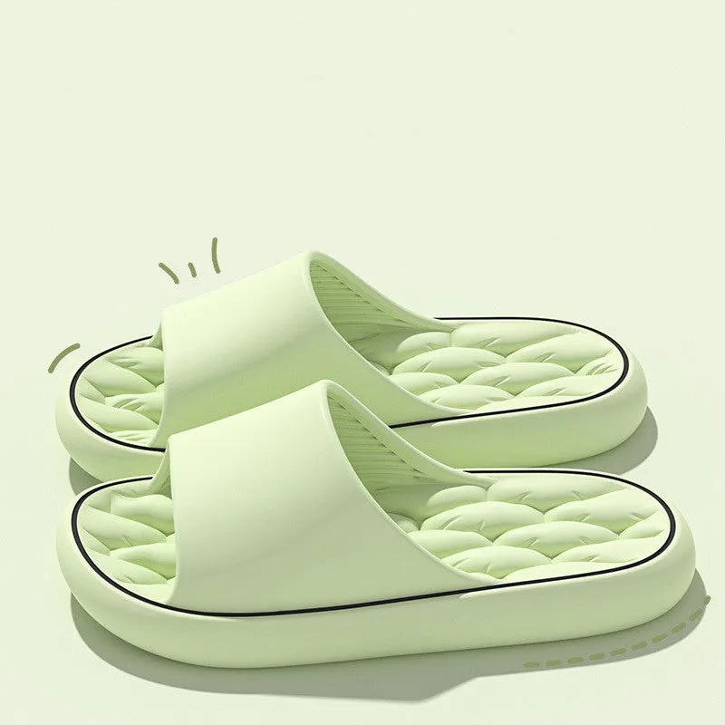 Non-slip EVA bathroom slippers with thick sole and hollow upper in grey, side view