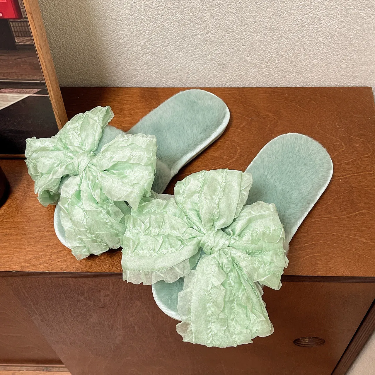 Women's big bow cotton slippers with plush upper and TPR sole, available in pink, white, and green sizes 36-41