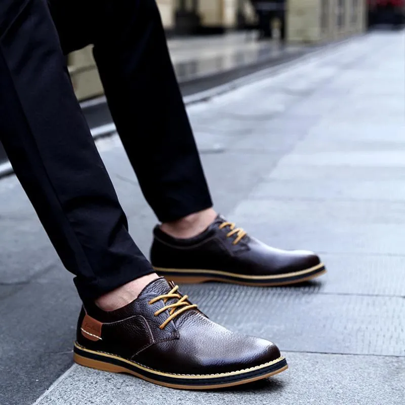 Large size 48 men's British style leather shoes in black with microfiber upper and rubber sole