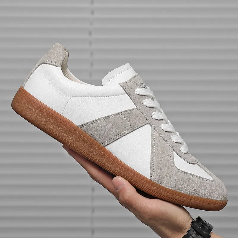 White retro Japanese-style low-top casual sneakers with round toe and flat rubber sole