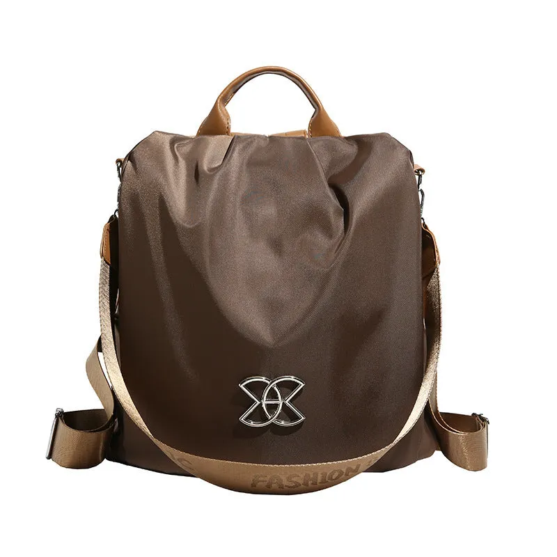 Women's black travel backpack with contrast stitching, large capacity, and three-dimensional outer pocket