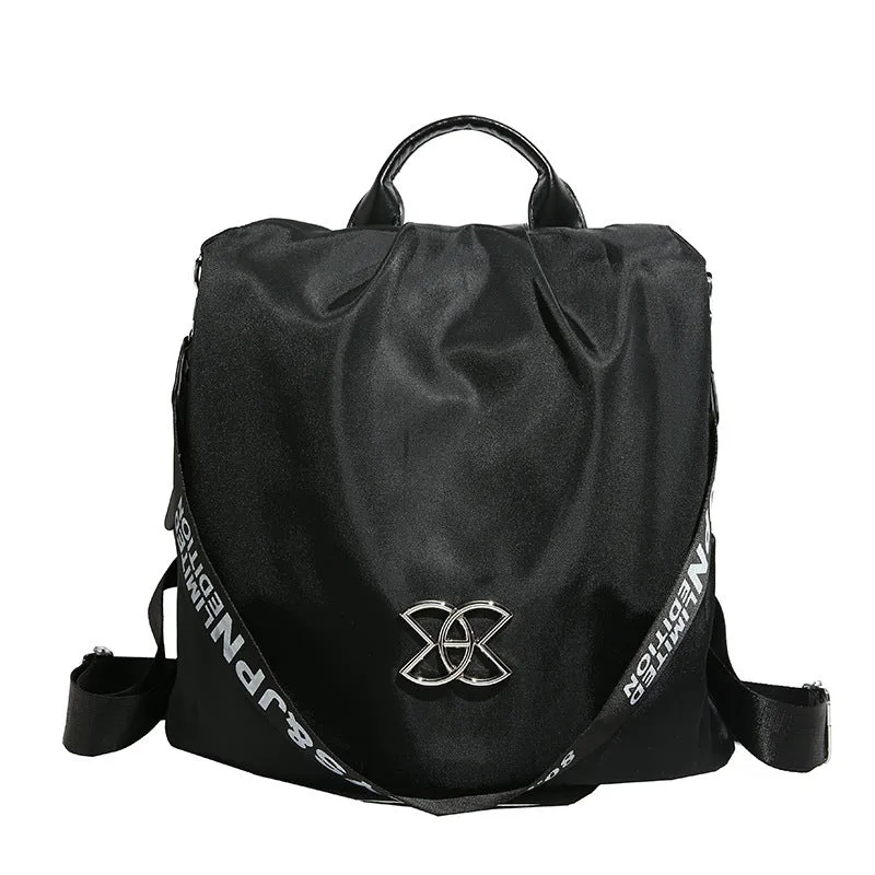 Women's black travel backpack with contrast stitching, large capacity, and three-dimensional outer pocket