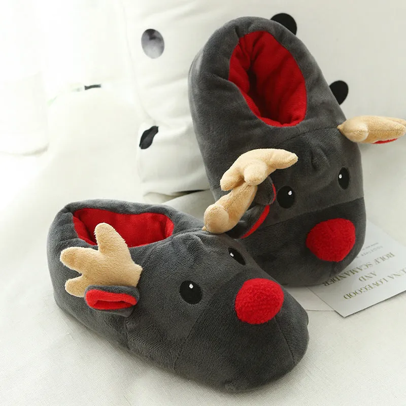 Grey super soft fleece home slippers with cute elk design, placed on a floor