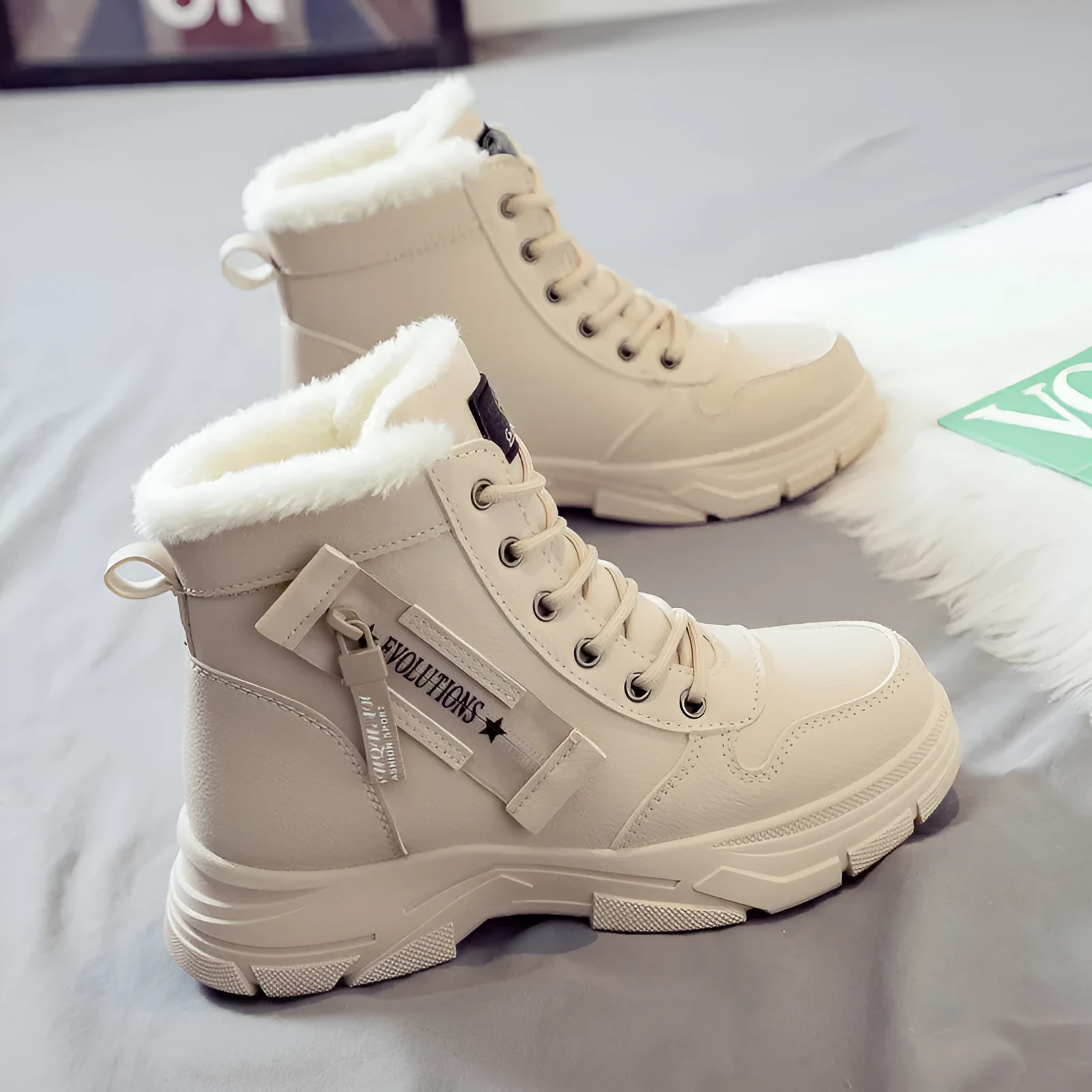 Women's plus size tall black snow boot with velvet lining and lace-up front on a rubber sole.
