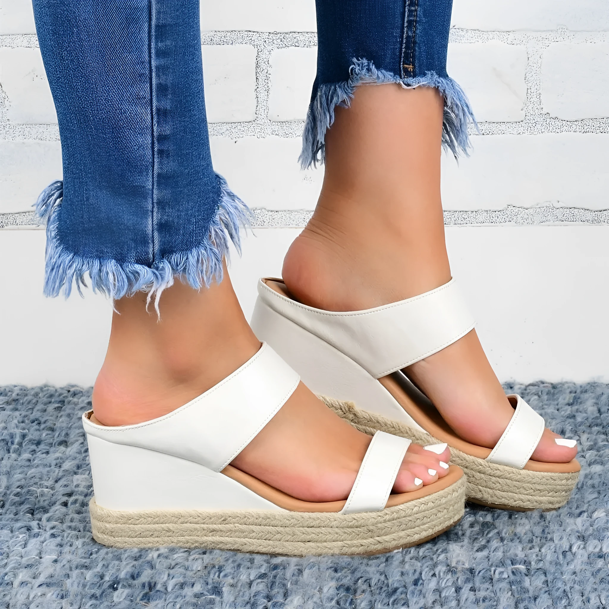 Women's wedge heel slippers in white with hollow design, round toe, and rubber sole