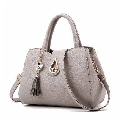 SMOOZA large PU leather tassel handbag with lock closure in beige