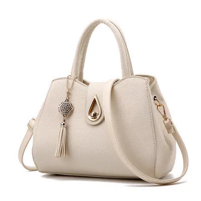 SMOOZA large PU leather tassel handbag with lock closure in beige