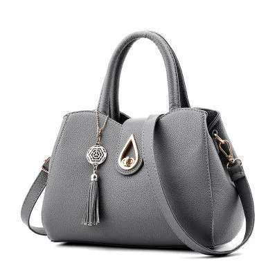 SMOOZA large PU leather tassel handbag with lock closure in beige