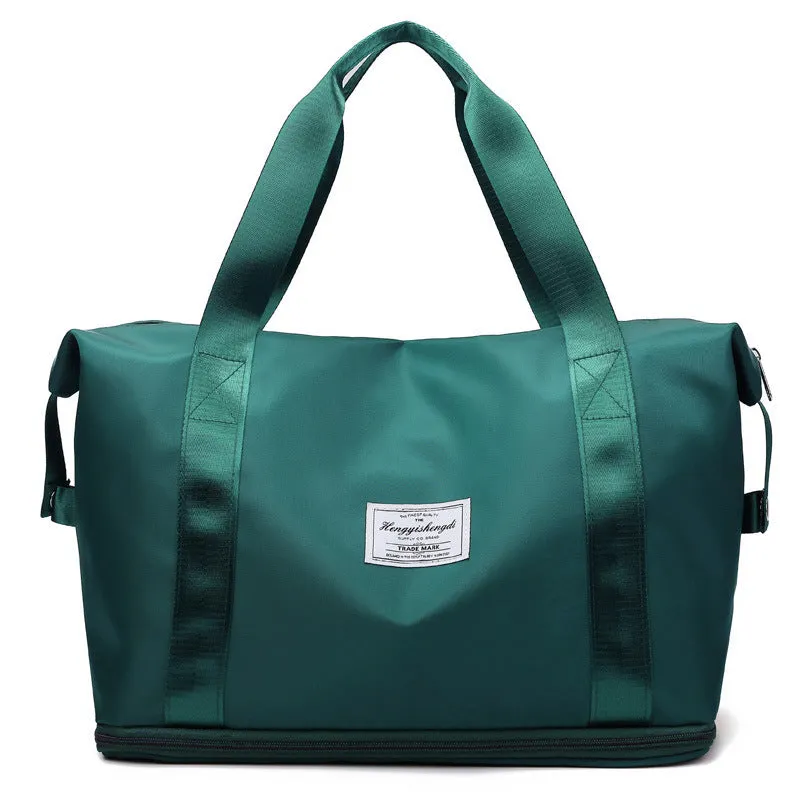 Large capacity Oxford cloth shoulder bag in lake green with multiple zippered pockets for travel