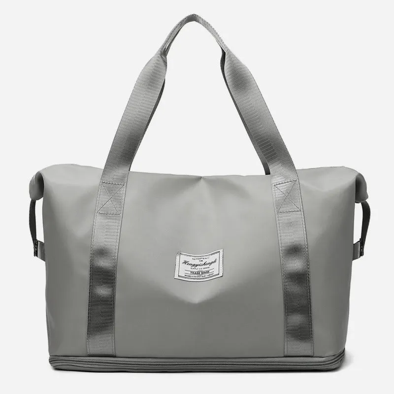 Large capacity Oxford cloth shoulder bag in lake green with multiple zippered pockets for travel