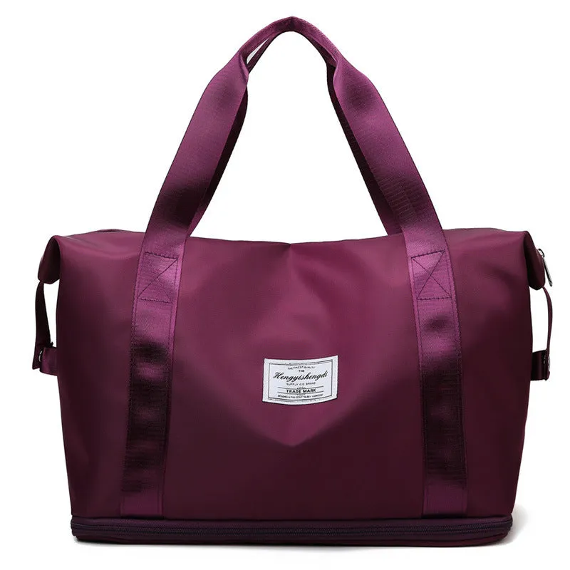 Large capacity Oxford cloth shoulder bag in lake green with multiple zippered pockets for travel