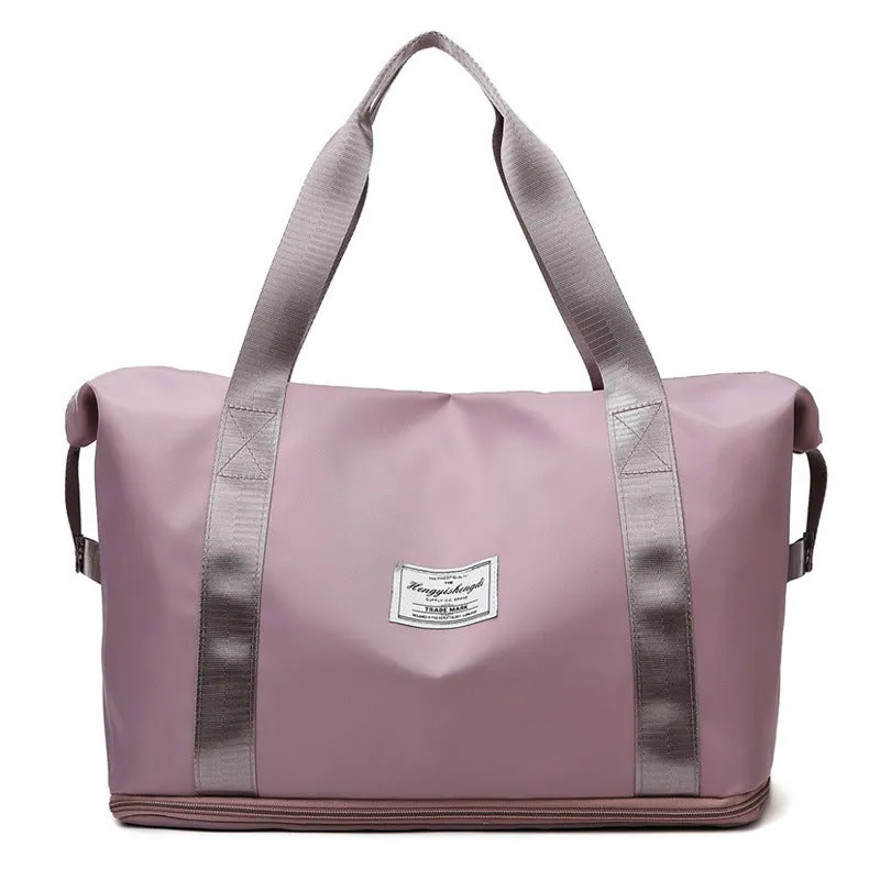 Large capacity Oxford cloth shoulder bag in lake green with multiple zippered pockets for travel