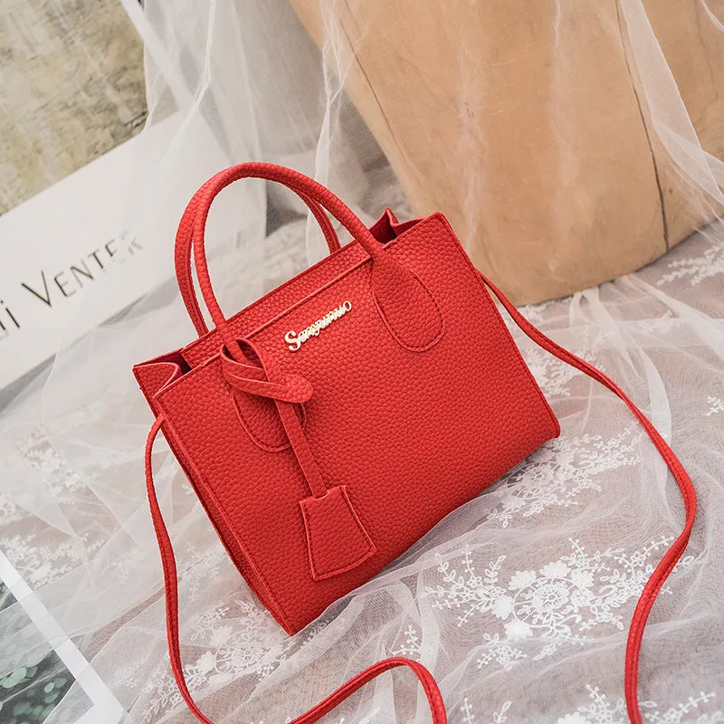 Women's messenger one-shoulder mobile phone bag in PU with zipper closure, square vertical section shape, letter print, available in multiple colours