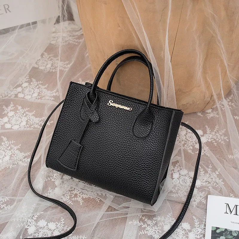 Women's messenger one-shoulder mobile phone bag in PU with zipper closure, square vertical section shape, letter print, available in multiple colours