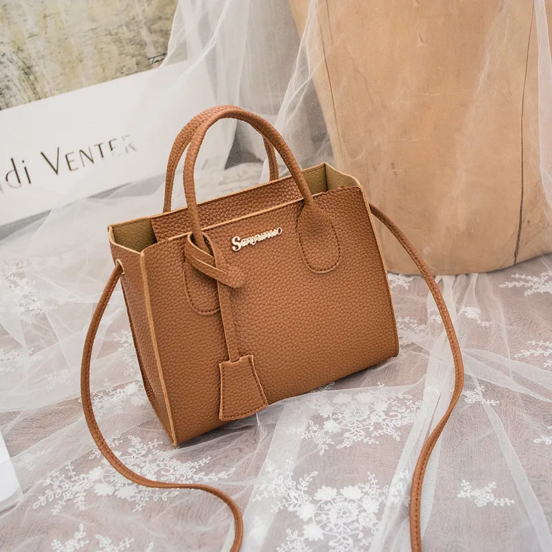 Women's messenger one-shoulder mobile phone bag in PU with zipper closure, square vertical section shape, letter print, available in multiple colours