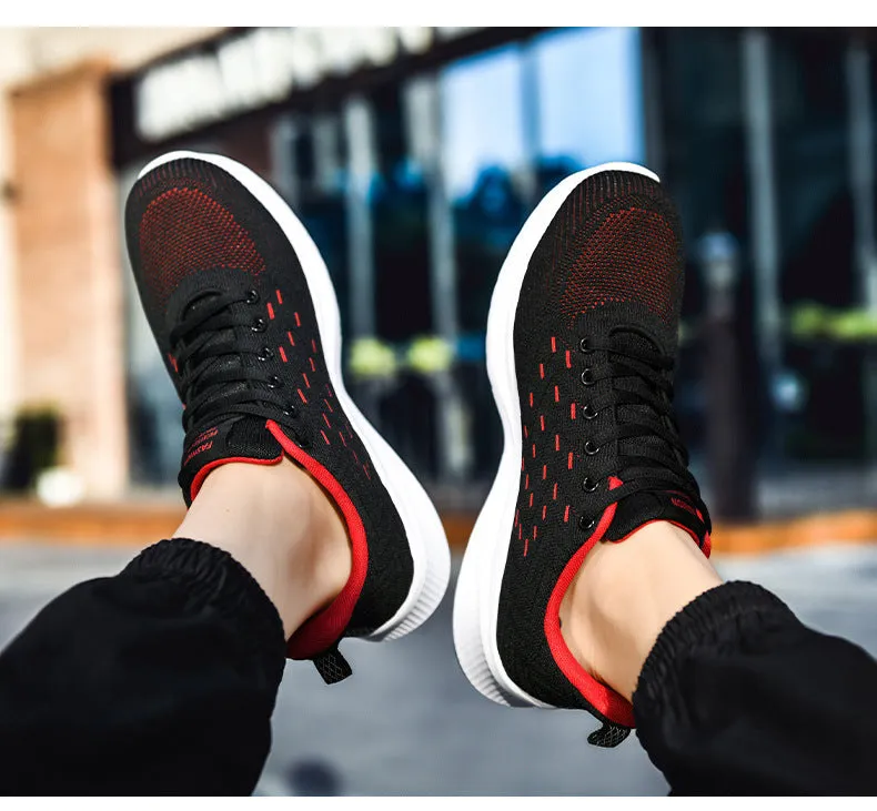 Men's breathable lightweight running shoes in grey with woven fabric upper and cross-strap design