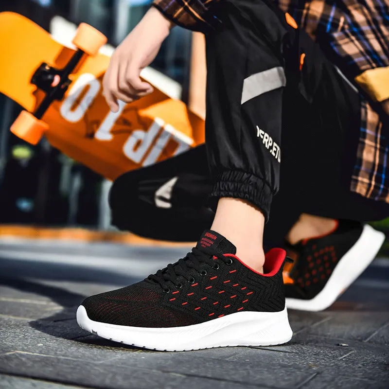 Men's breathable lightweight running shoes in grey with woven fabric upper and cross-strap design