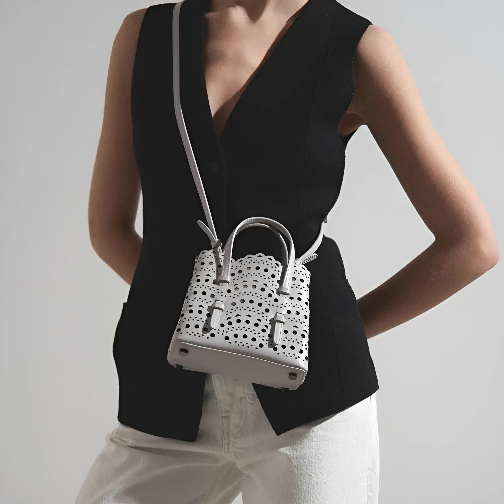 Hollow carved square messenger bag in PU with three shoulder straps