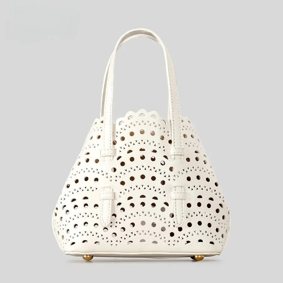 Hollow carved square messenger bag in PU with three shoulder straps