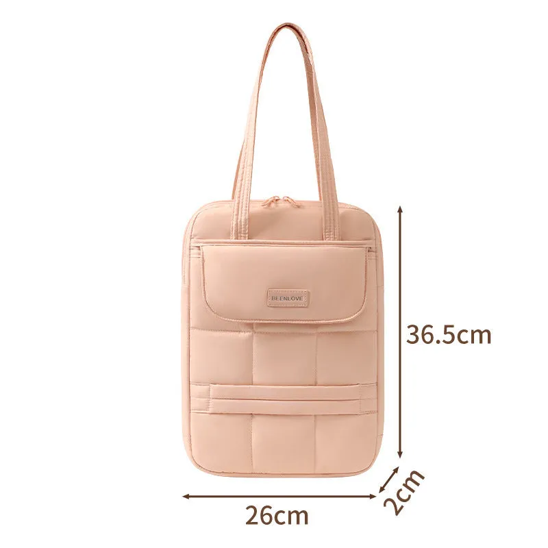 Unisex 15-inch laptop bag in beige with waterproof polyester exterior and baby velvet lining, urban simplicity style