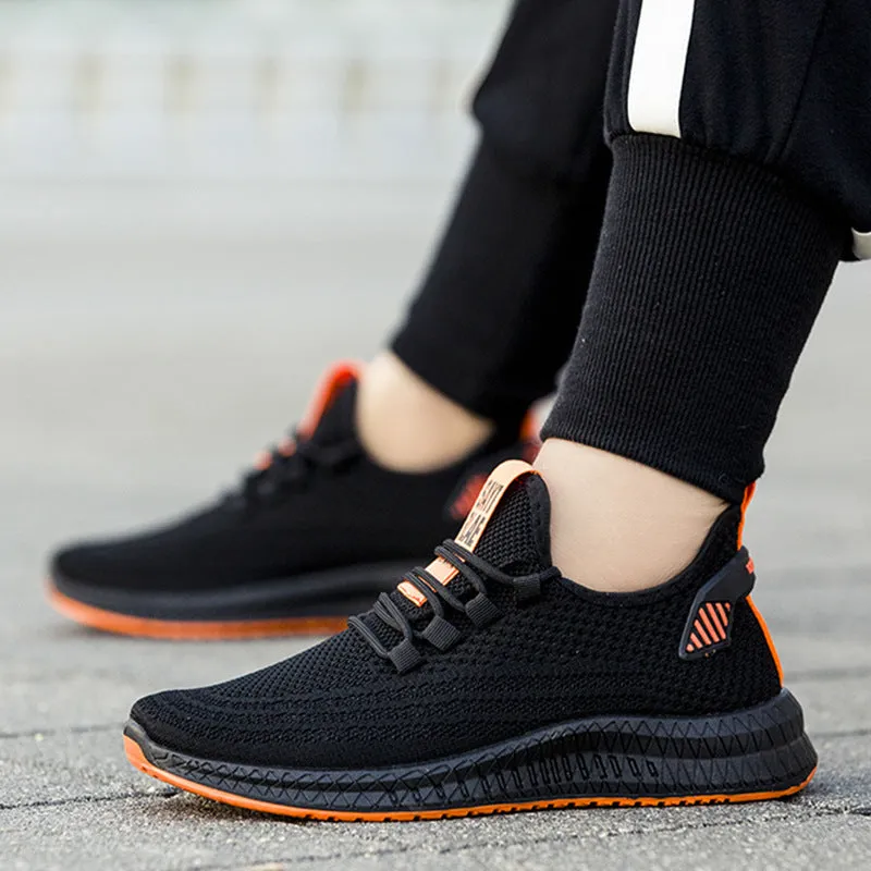Men's flying woven casual sneakers in orange with white sole, low-top design