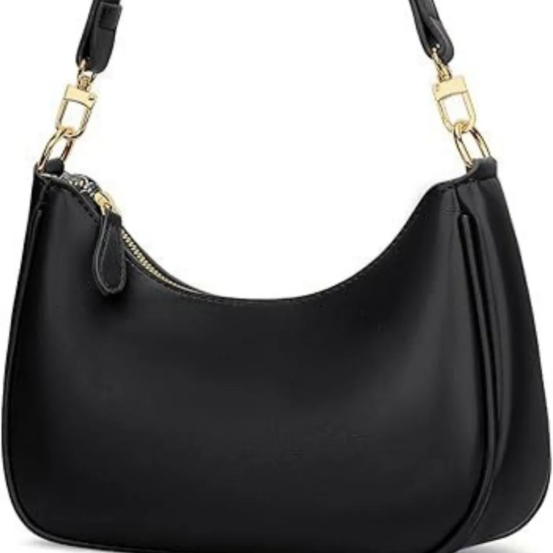 Black women's retro PU shoulder bag with horizontal square shape and sewing thread detailing on plain background