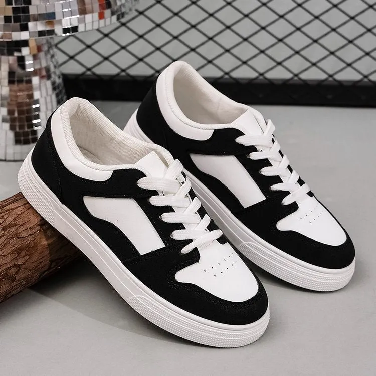 Black women's casual sports shoes with artificial PU upper and rubber sole, showing round toe and lace-up design