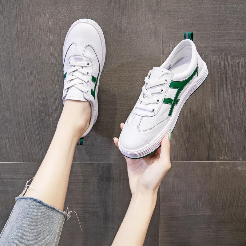 White and black low top cowhide sneakers with elastic band and round toe