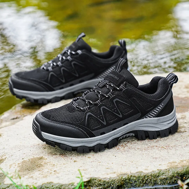 Men's black hiking shoes with low heel, breathable microfiber upper, and wear-resistant sole for camping and running