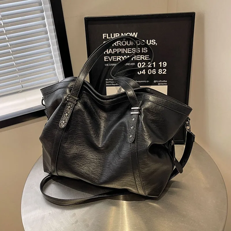 Retro soft PU leather messenger bag in black with horizontal square shape and sewing thread detail