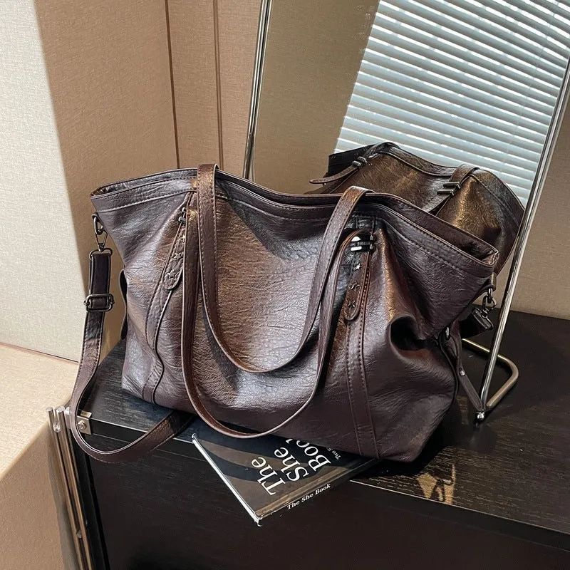 Retro soft PU leather messenger bag in black with horizontal square shape and sewing thread detail