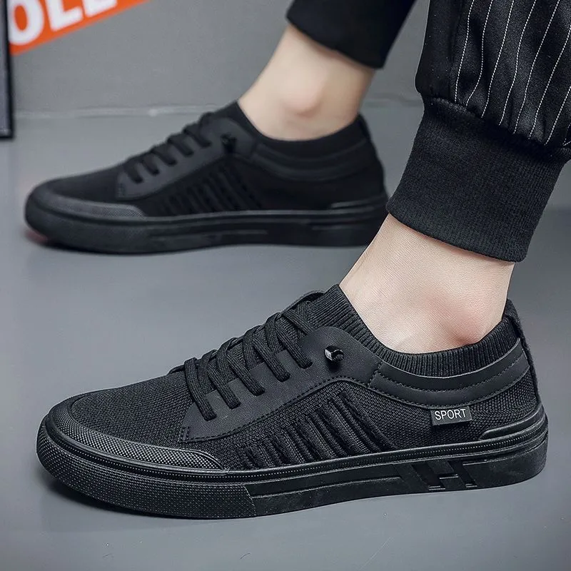 Men's casual skateboard shoes in solid colour with low top, flat heel, mesh lining, and injection-moulded sole