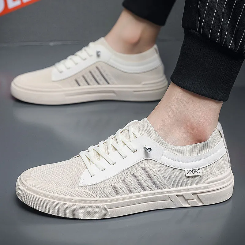 Men's casual skateboard shoes in solid colour with low top, flat heel, mesh lining, and injection-moulded sole