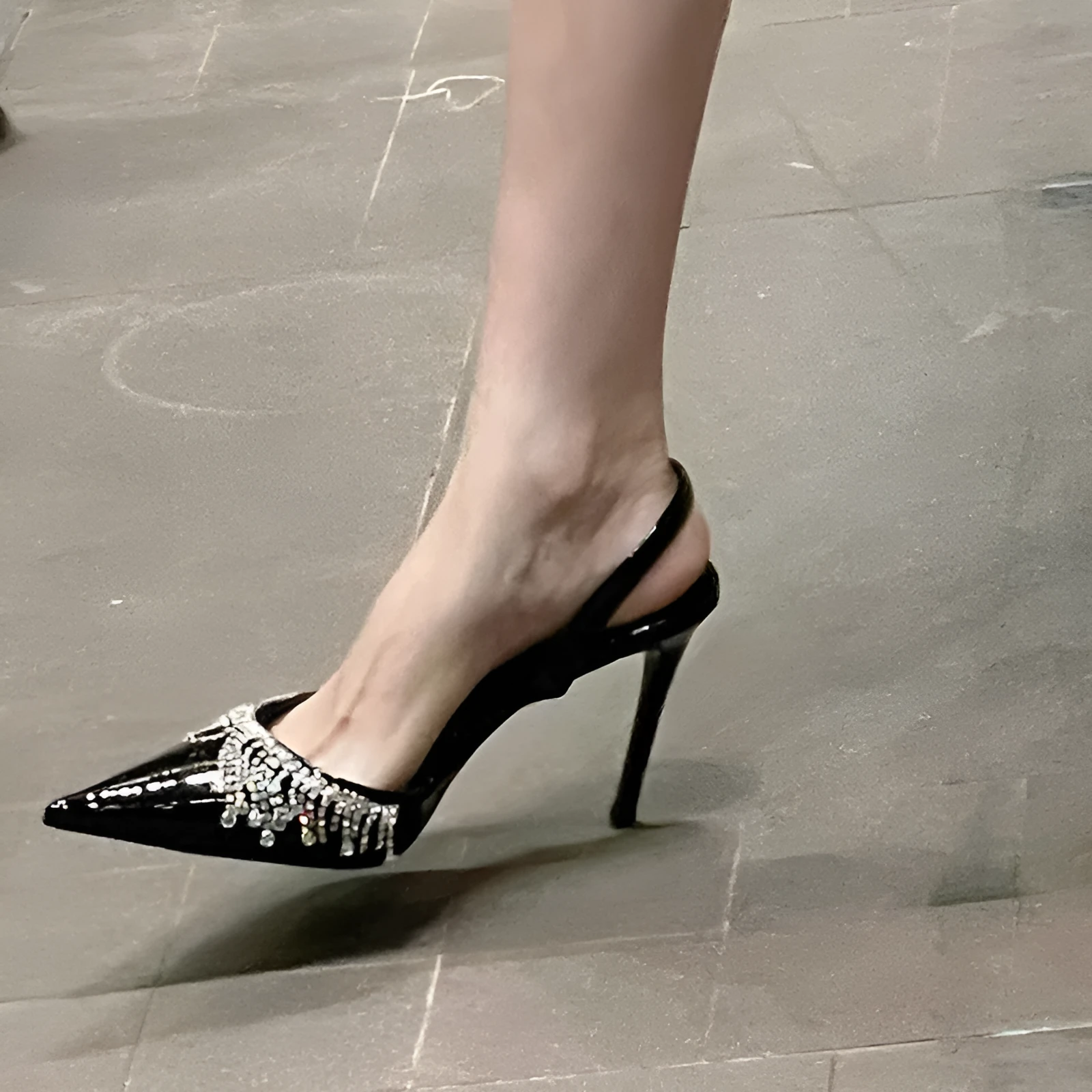 Black French tassel rhinestone slingback high heel sandals with a 10cm heel and pointed toe.