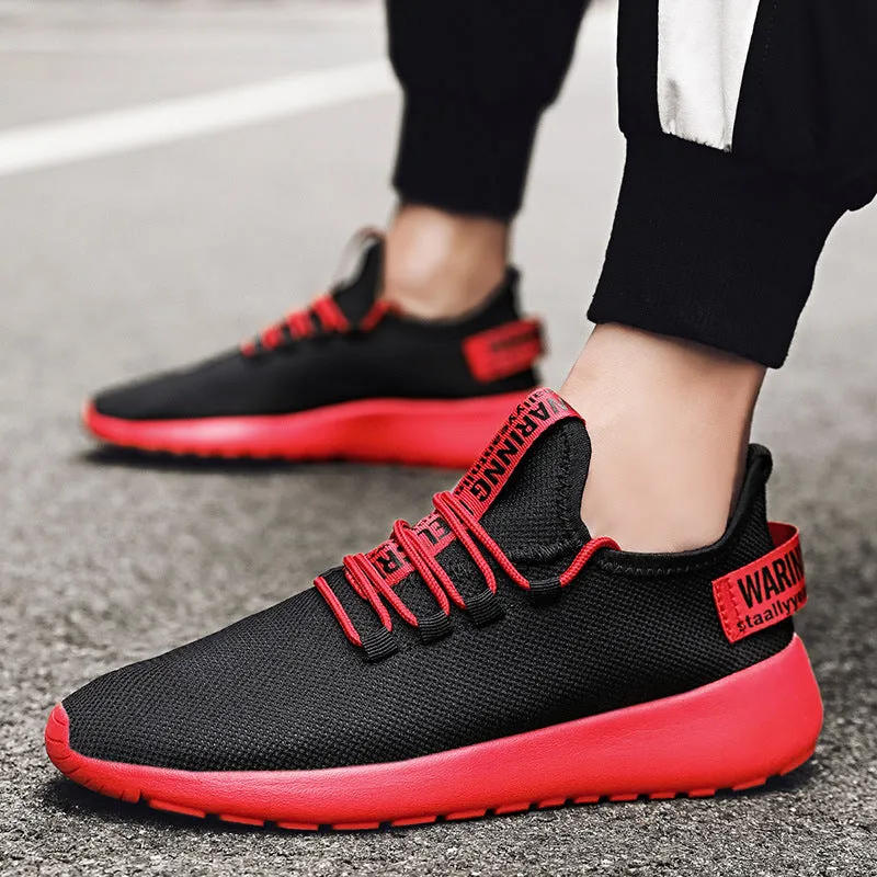 Men's breathable fly weave sports running shoes black and white colour side view