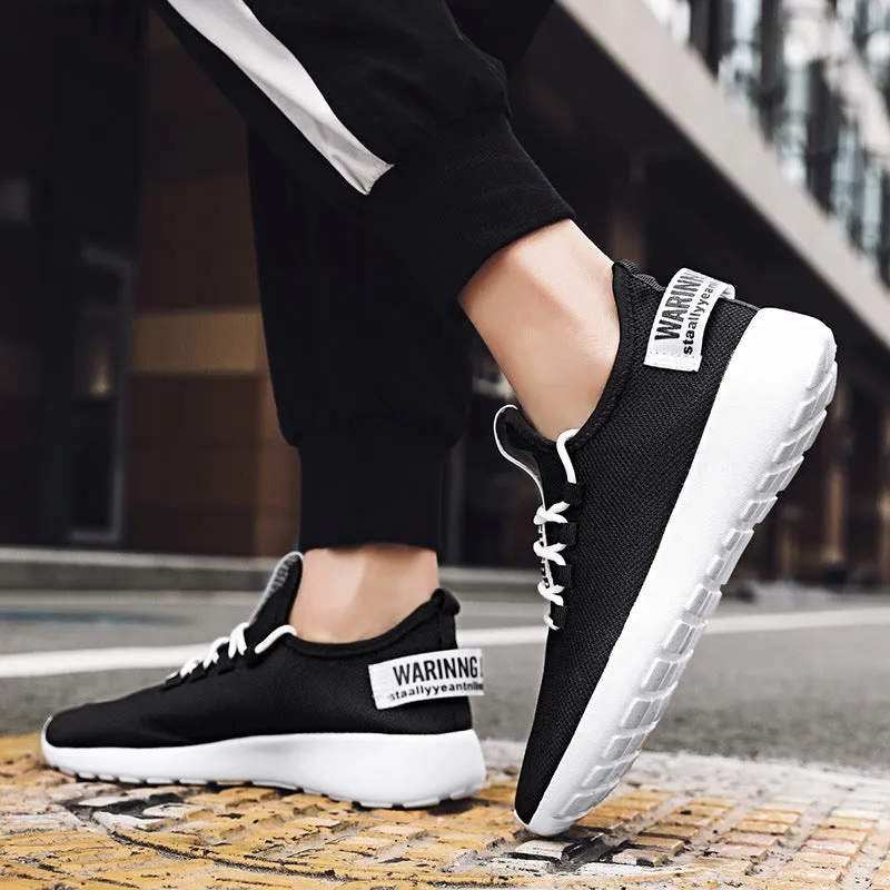 Men's breathable fly weave sports running shoes black and white colour side view