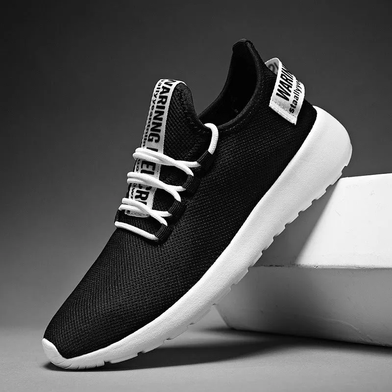 Men's breathable fly weave sports running shoes black and white colour side view