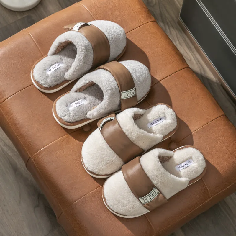 Beige plush velcro slippers with a round toe and non-slip plastic sole on a wooden floor.