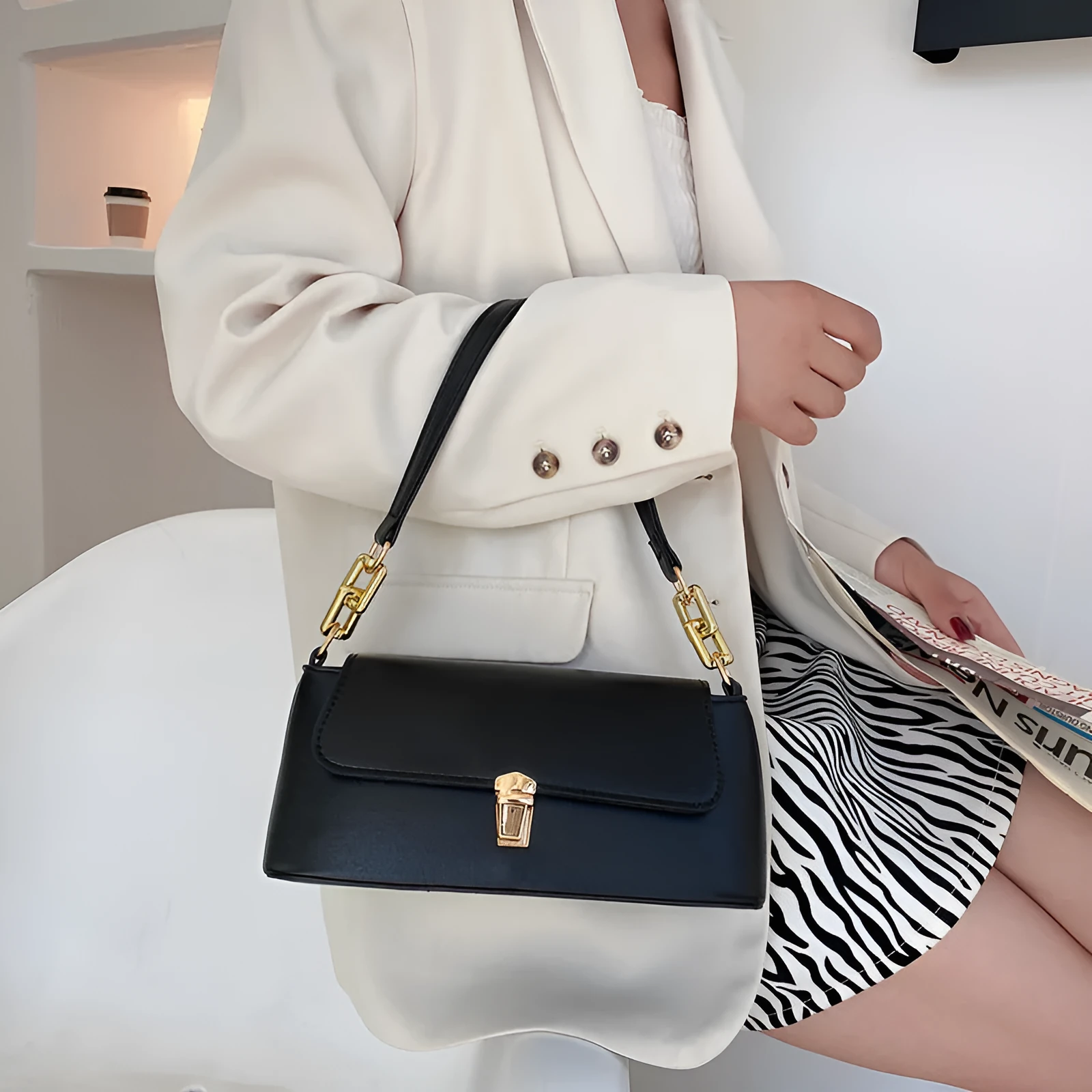 French casual brown PU underarm shoulder bag with chain strap and horizontal square sandwich pocket design.