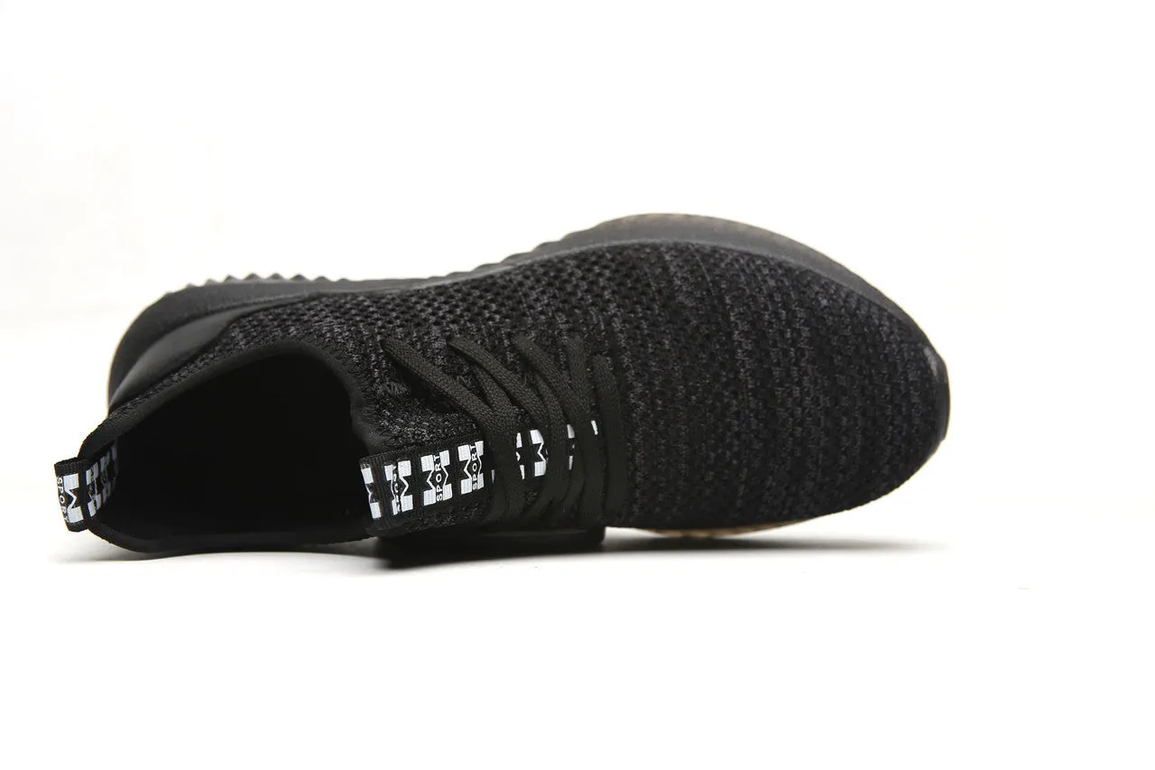 Steel toe cap safety shoes with EVA sole in black colour, low-top design for work and climbing
