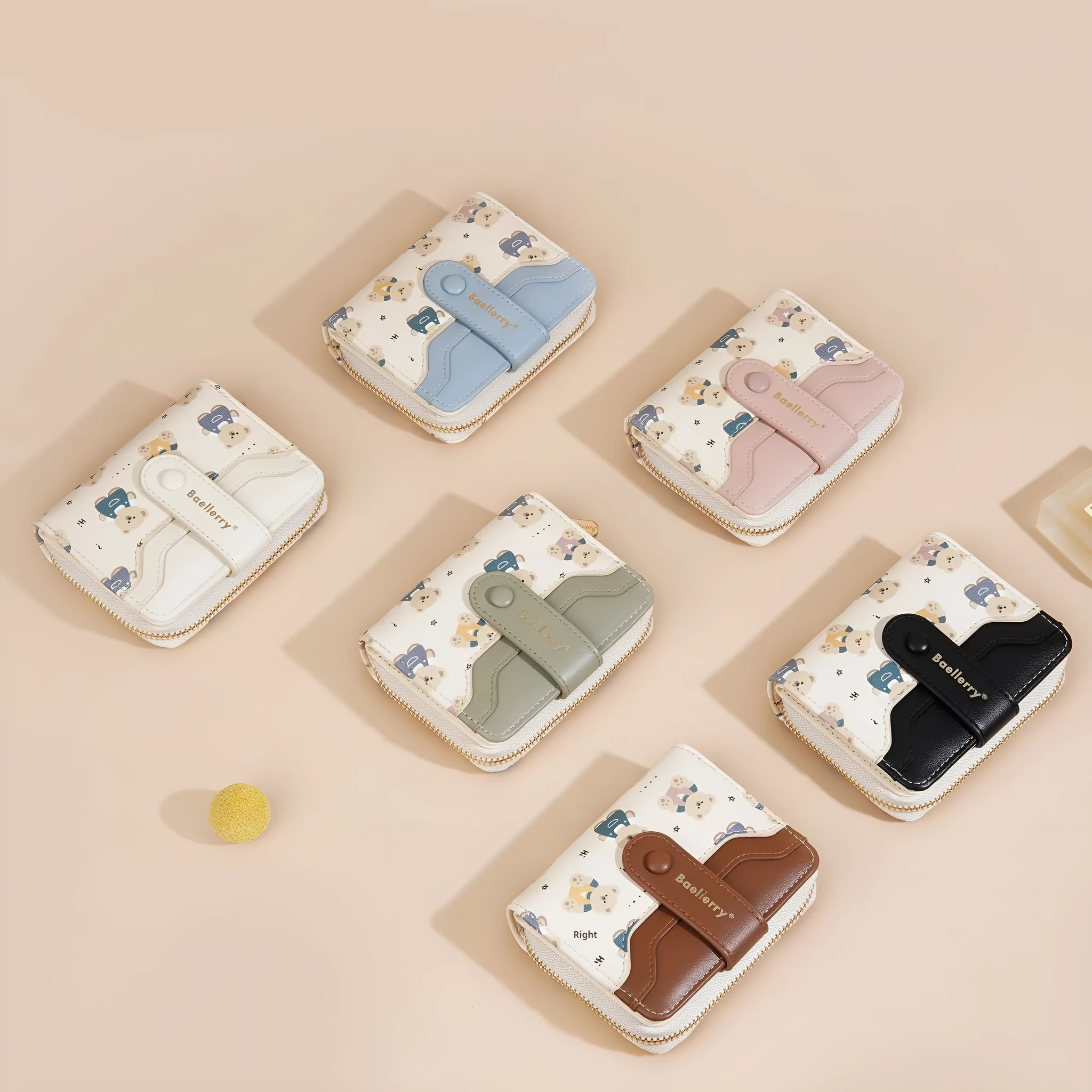 Cartoon printed women's wallet in beige with visible sewing thread details and short horizontal shape